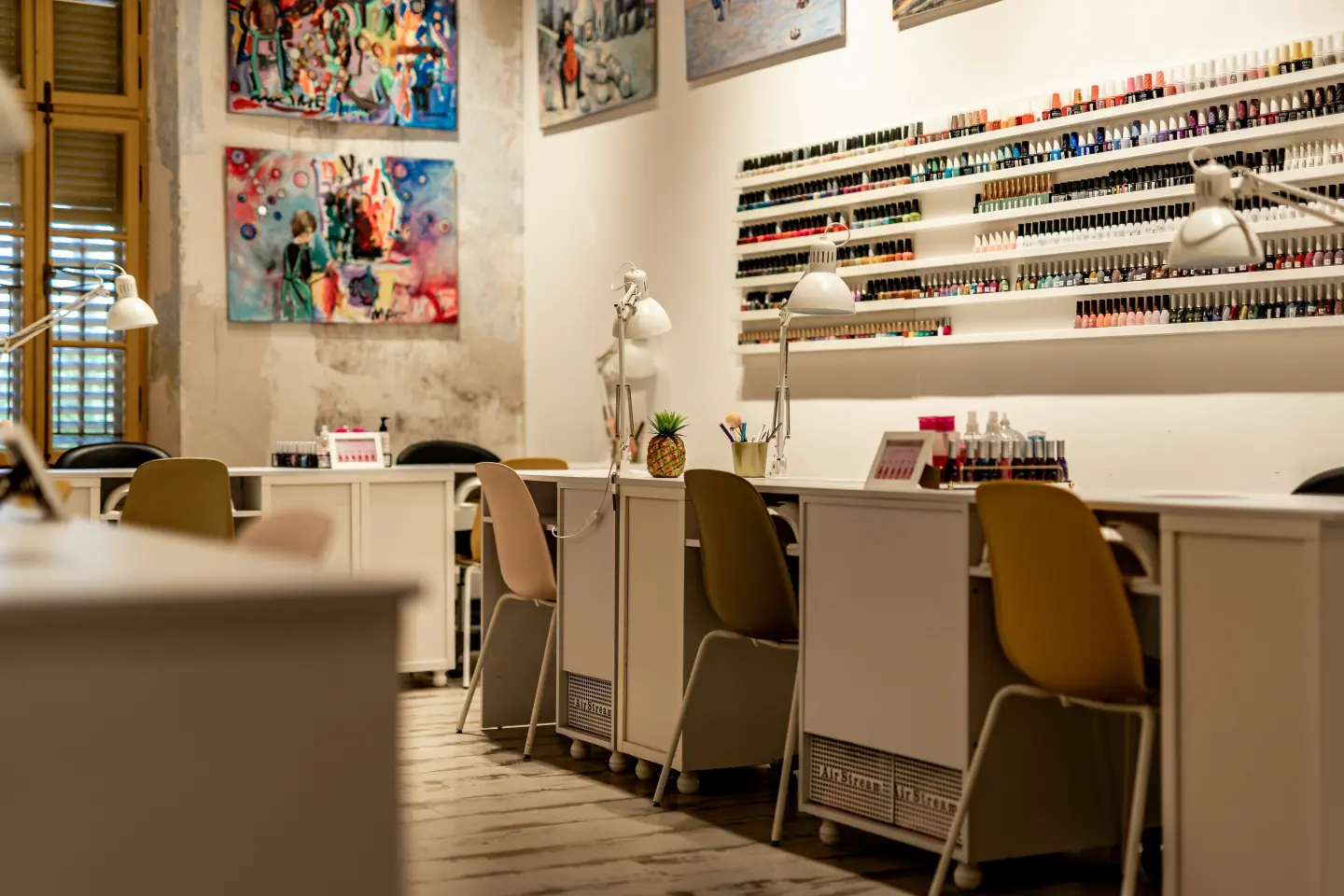 Nail salon interior with manicure tables